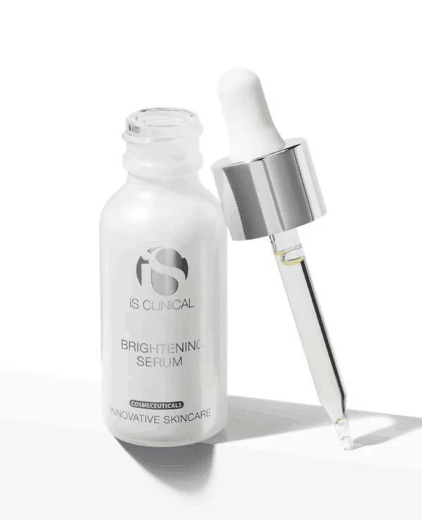 A white glass bottle labeled "Brightening Serum 15ml" is shown with a silver and white dropper cap beside it, some serum visible in the dropper.